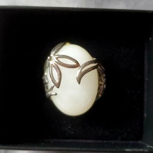NIB. Sterling Silver and White Opal ring